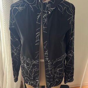 Fabletics Black and White Bomber Jacket with Modern Design